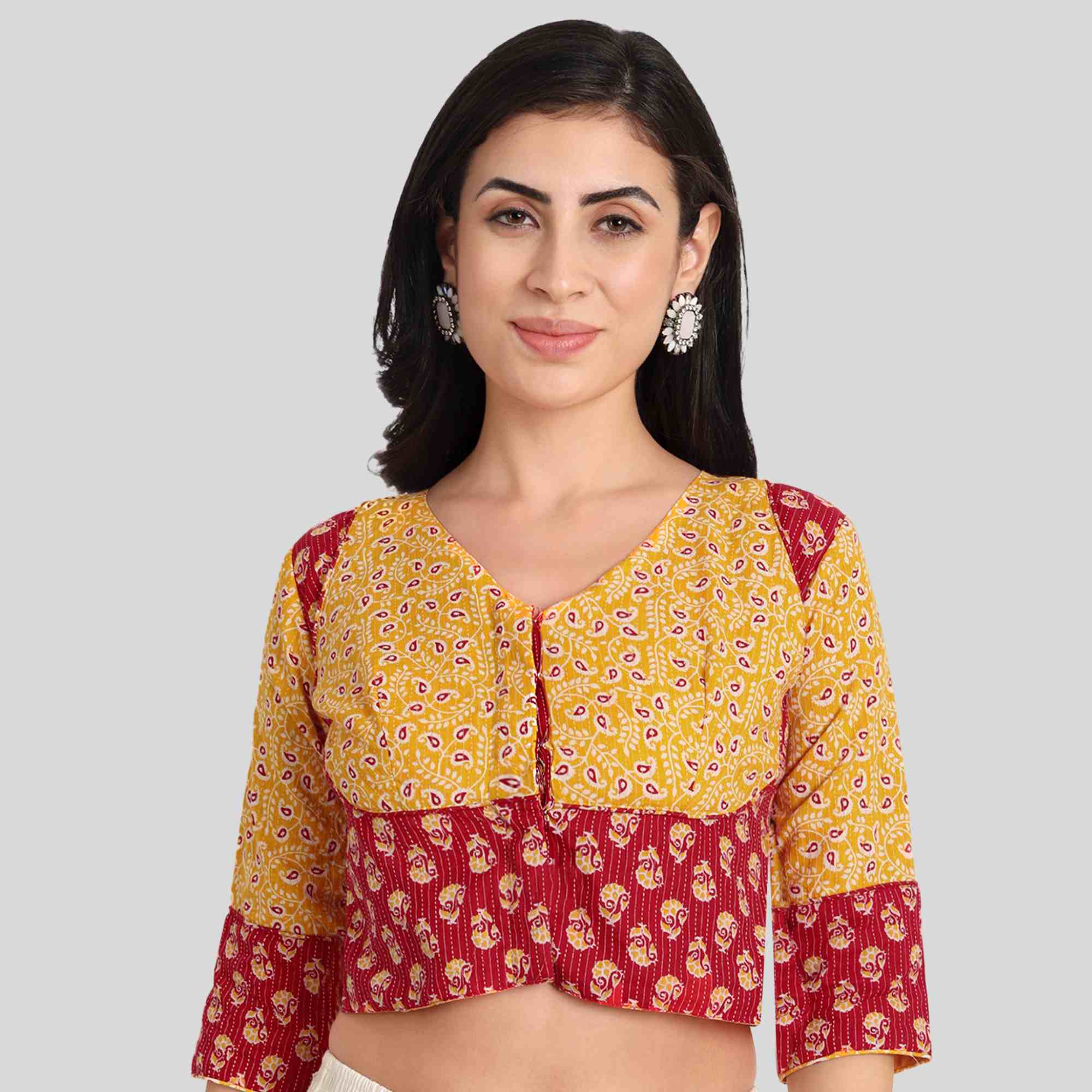 long blouse in crop to model in color yellow and red