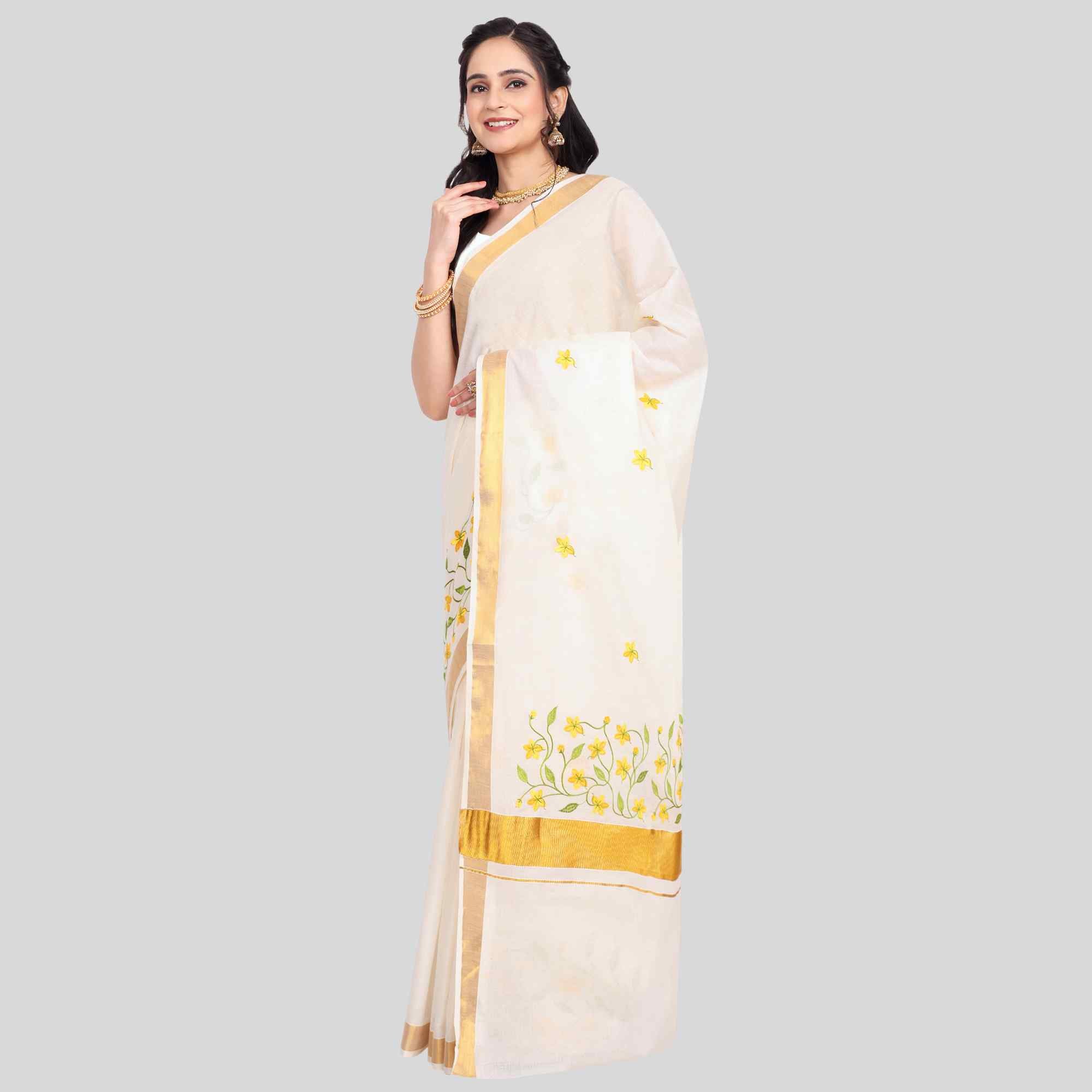 Kerala Saree with golden flower embroidery