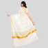 Golden yellow floral embroidered kerala saree