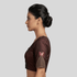 pink and gold butterfly embroidery on the sleeve,